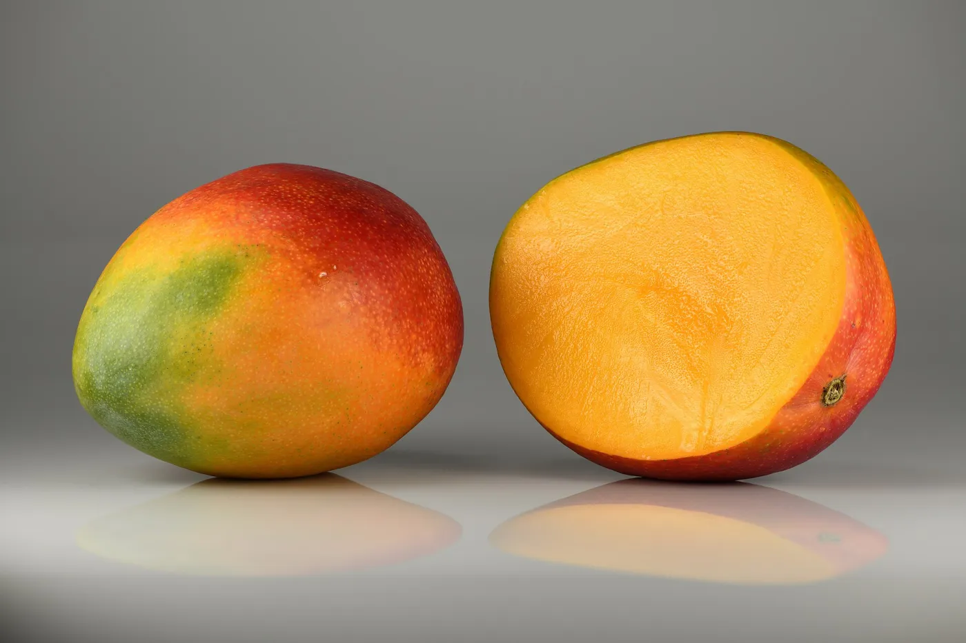 Mango fruits – single and halved. Grown in Brazil
